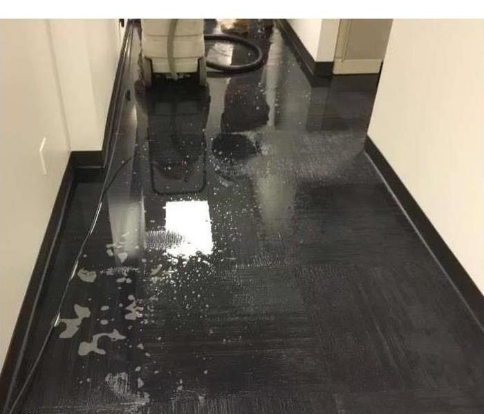 Wet carpet floor in an office